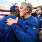 Head coach Pete Carroll of the Seattle Seahawks and head coach Vance Joseph of the Denver Broncos shake hands on the field after the Broncos' 27-24 win over the Seahawks at Broncos Stadium at Mile High on September 9, 2018 in Denver, Colorado. (Photo by Dustin Bradford/Getty Images)