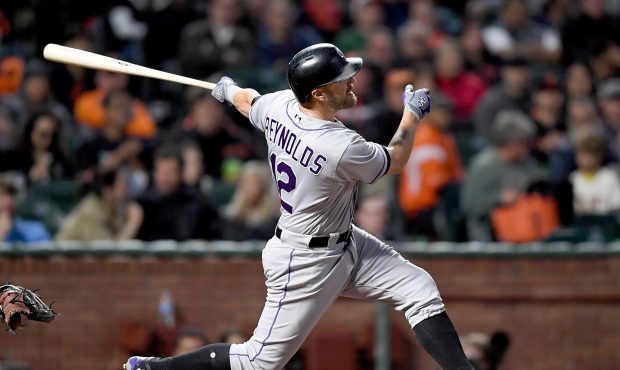 SAN FRANCISCO, CA - JUNE 27:  Mark Reynolds #12 of the Colorado Rockies swings and watches the flig...