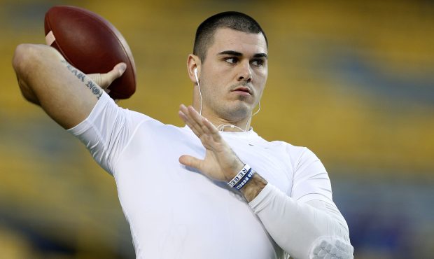 Chad Kelly #10 of the Mississippi Rebels warms up before a game against the LSU Tigers at Tiger Sta...