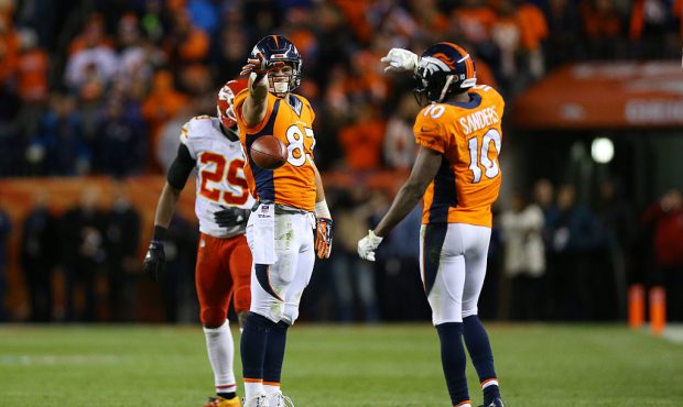 Tight end A.J. Derby #83 of the Denver Broncos celebrates a first down in overtime against the Kans...