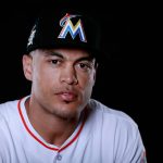 Giancarlo Stanton #27 of the Miami Marlins poses for a photograph at Spring Training photo day at Roger Dean Stadium on February 18, 2017 in Jupiter, Florida.  (Photo by Chris Trotman/Getty Images)
