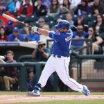 Mike Moustakas #8 of the Kansas City Royals bats against the Texas Rangers during the spring training game at Surprise Stadium on February 26, 2017 in Surprise, Arizona.  (Photo by Christian Petersen/Getty Images)