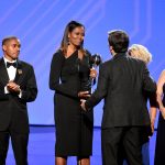 Special Olympics Chairman Timothy Shriver (R) accepts the Arthur Ashe Courage Award on behalf of his late mother, Special Olympics founder Eunice Kennedy Shriver, from former First Lady Michelle Obama (C) and Special Olympics athletes onstage at The 2017 ESPYS at Microsoft Theater on July 12, 2017 in Los Angeles, California.  (Photo by Kevin Winter/Getty Images)