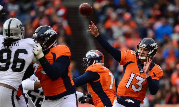 DENVER, CO - JANUARY 1:  Quarterback Trevor Siemian #13 of the Denver Broncos throws in the first h...