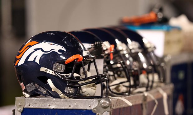OAKLAND, CA - DECEMBER 06: Denver Broncos helmets sit on the bench during their game against the Oa...
