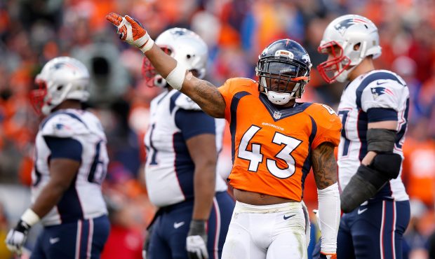 DENVER, CO - JANUARY 24: T.J. Ward #43 of the Denver Broncos gestures after a play in the first hal...