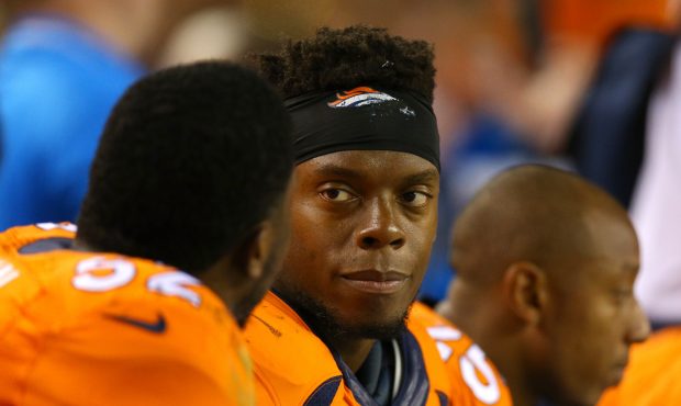 Inside linebacker Brandon Marshall #54 of the Denver Broncos looks on from the bench in the first h...