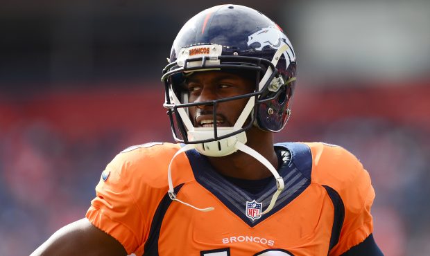 Wide receiver Emmanuel Sanders #10 of the Denver Broncos looks on during warm ups before the game a...