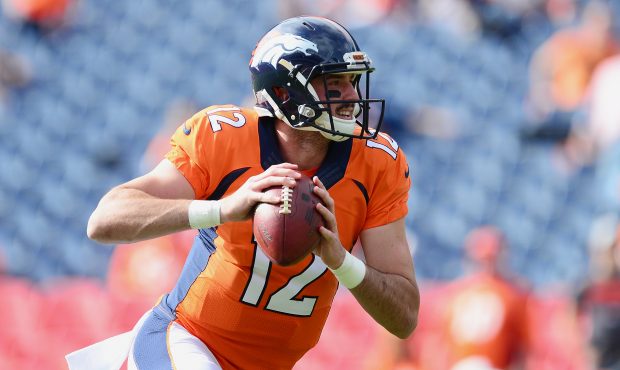 Quarterback Paxton Lynch #12 of the Denver Broncos warms up before the game against the San Diego C...