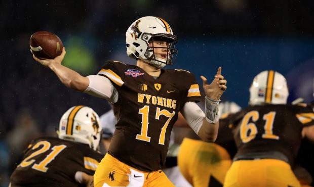 SAN DIEGO, CA - DECEMBER 21: Josh Allen #17 of the Wyoming Cowboys passes the ball during the first...