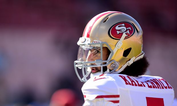 Colin Kaepernick #7 of the San Francisco 49ers warms up before the game against the Los Angeles Ram...