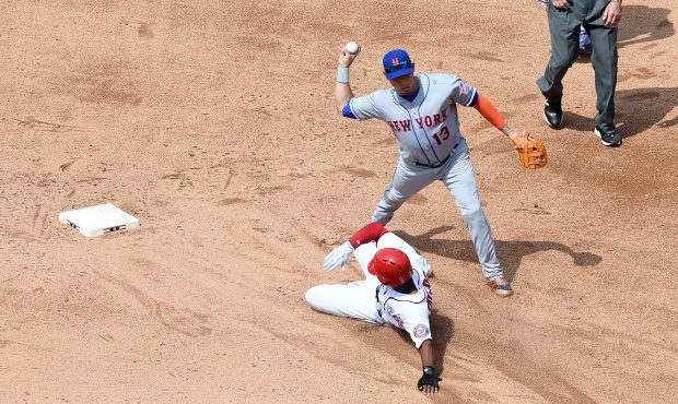 WASHINGTON, DC - APRIL 29: Asdrubal Cabrera #13 of the New York Mets forces out Michael Taylor #3 o...