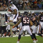 CHICAGO, IL - AUGUST 10:    Cody Latimer #14 of the Denver Broncos catches a pass over John Timu #53 and Sherrick McManis #27 of the Chicago Bears during a preseason game at Soldier Field on August 10, 2017 in Chicago, Illinois. The Broncos defeated the Bears 24-17. (Photo by Jonathan Daniel/Getty Images)