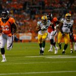 DENVER, CO - AUGUST 26:  Running back C.J. Anderson #22 of the Denver Broncos runs for a touchdown in the first quarter during a Preseason game against the Green Bay Packers at Sports Authority Field at Mile High on August 26, 2017 in Denver, Colorado. (Photo by Justin Edmonds/Getty Images)