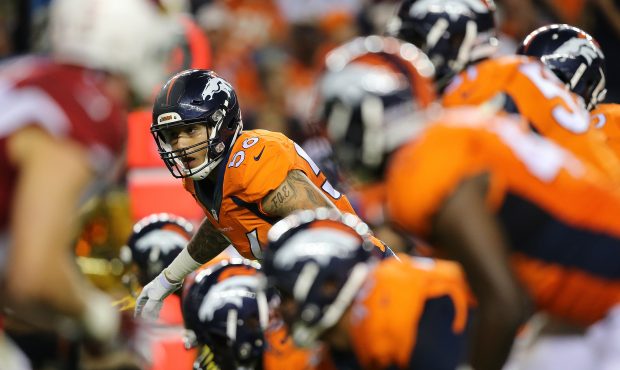 Linebacker Shane Ray (56) of the Denver Broncos and the defense prepare to rush the line of scrimma...