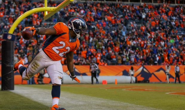 DENVER, CO - DECEMBER 28:  Running back C.J. Anderson #22 of the Denver Broncos celebrates a third ...