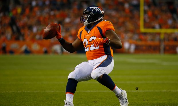 DENVER, CO - AUGUST 26:  Running back C.J. Anderson #22 of the Denver Broncos runs for a touchdown ...