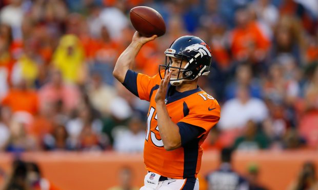 DENVER, CO - AUGUST 26: Quarterback Trevor Siemian #13 of the Denver Broncos throws a pass in the f...