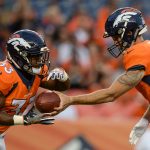 DENVER, CO - AUGUST 31: Kyle Sloter #1 hands off to running back De'Angelo Henderson #33 of the Denver Broncos in the first quarter during a preseason NFL game at Sports Authority Field at Mile High on August 31, 2017 in Denver, Colorado. (Photo by Dustin Bradford/Getty Images)