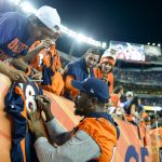DENVER, CO - AUGUST 31: Outside linebacker Von Miller #58 of the Denver Broncos signs autographs for fans in the front row during a preseason NFL game against the Arizona Cardinals at Sports Authority Field at Mile High on August 31, 2017 in Denver, Colorado. (Photo by Dustin Bradford/Getty Images)