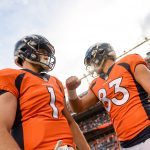 DENVER, CO - AUGUST 31: Quarterback Kyle Sloter #1 of the Denver Broncos walks on the field along with tight end A.J. Derby #83 during player introductions before a preseason NFL game against the Arizona Cardinals at Sports Authority Field at Mile High on August 31, 2017 in Denver, Colorado. (Photo by Dustin Bradford/Getty Images)