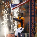 DENVER, CO - SEPTEMBER 11:  Wide receiver Emmanuel Sanders #10 of the Denver Broncos is introduced to the game while carrying the American Flag at Sports Authority Field at Mile High on September 11, 2017 in Denver, Colorado. (Photo by Justin Edmonds/Getty Images)