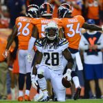 DENVER, CO - SEPTEMBER 11:  Running back Melvin Gordon #28 of the Los Angeles Chargers races to being tackled for a loss in the third quarter of the game against the Denver Broncos at Sports Authority Field at Mile High on September 11, 2017 in Denver, Colorado. (Photo by Dustin Bradford/Getty Images)