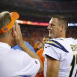 DENVER, CO - SEPTEMBER 11:  quarterback Philip Rivers #17 of the Los Angeles Chargers to his former head coach Mike McCoy after losing the game to the Denver Broncos at Sports Authority Field at Mile High on September 11, 2017 in Denver, Colorado. (Photo by Justin Edmonds/Getty Images)
