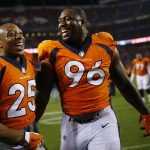 DENVER, CO - SEPTEMBER 11:  Defensive end Shelby Harris #96 of the Denver Broncos celebrates winning the game with Chris Harris #25 against the Los Angeles Chargers at Sports Authority Field at Mile High on September 11, 2017 in Denver, Colorado. Harris blocked the game-tying field goal in the fourth quarter. (Photo by Justin Edmonds/Getty Images)