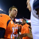 DENVER, CO - SEPTEMBER 11:  Quarterback Trevor Siemian #13 of the Denver Broncos talks with quarterback Philip Rivers #17 of the Los Angeles Chargers after the Denver Broncos won the game at Sports Authority Field at Mile High on September 11, 2017 in Denver, Colorado. (Photo by Dustin Bradford/Getty Images)