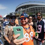 DENVER, CO - SEPTEMBER 17:  Denver Broncos and Denver Broncos fans take a selfie before a game between the Denver Broncos and the Dallas Cowboys at Sports Authority Field at Mile High on September 17, 2017 in Denver, Colorado. (Photo by Dustin Bradford/Getty Images)