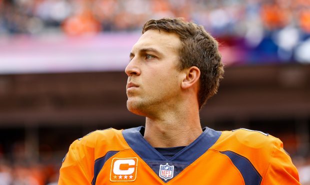 Quarterback Trevor Siemian #13 of the Denver Broncos looks on during the national anthem before a g...