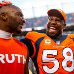 DENVER, CO - SEPTEMBER 17:  Outside linebacker Von Miller #58 of the Denver Broncos and cornerback Aqib Talib #21 of the Denver Broncos celebrate as they walk off the field after the Denver Broncos 42-17 win over the  at Sports Authority Field at Mile High on September 17, 2017 in Denver, Colorado. (Photo by Justin Edmonds/Getty Images)