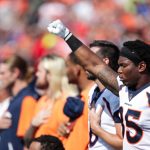 ORCHARD PARK, NY - SEPTEMBER 24:  Virgil Green #85 of the Denver Broncos raises his fist during the American National Anthem before an NFL game against the Buffalo Bills on September 24, 2017 at New Era Field in Orchard Park, New York.  (Photo by Brett Carlsen/Getty Images)