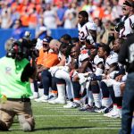 ORCHARD PARK, NY - SEPTEMBER 24:  Denver Broncos players kneel during the American National Anthem before an NFL game against the Buffalo Bills on September 24, 2017 at New Era Field in Orchard Park, New York.  (Photo by Brett Carlsen/Getty Images)
