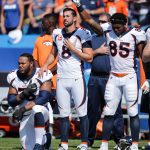 ORCHARD PARK, NY - SEPTEMBER 24:  Max Garcia #76, Brandon McManus #8 and Virgil Green #85, all of the Denver Broncos, during the American National Anthem before an NFL game against the Buffalo Bills on September 24, 2017 at New Era Field in Orchard Park, New York.  (Photo by Brett Carlsen/Getty Images)