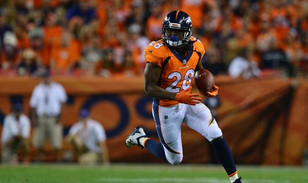 DENVER, CO - SEPTEMBER 11:  Running back Jamaal Charles #28 of the Denver Broncos rushes for 12 yar...