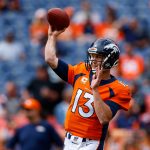 DENVER, CO - OCTOBER 1:  Quarterback Trevor Siemian #13 of the Denver Broncos throws during player warm ups before a game against the Oakland Raiders at Sports Authority Field at Mile High on October 1, 2017 in Denver, Colorado. (Photo by Justin Edmonds/Getty Images)