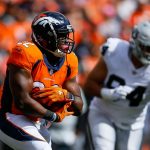 DENVER, CO - OCTOBER 1:  Running back C.J. Anderson #22 of the Denver Broncos rushes against the Oakland Raiders in the first quarter of a game at Sports Authority Field at Mile High on October 1, 2017 in Denver, Colorado. (Photo by Justin Edmonds/Getty Images)