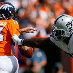 DENVER, CO - OCTOBER 1: Quarterback Trevor Siemian #13 of the Denver Broncos is sacked by defensive end Mario Edwards #97 of the Oakland Raiders in the first quarter of a game  at Sports Authority Field at Mile High on October 1, 2017 in Denver, Colorado. (Photo by Justin Edmonds/Getty Images)
