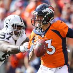DENVER, CO - OCTOBER 1:  Quarterback Trevor Siemian #13 of the Denver Broncos is sacked by defensive end Mario Edwards #97 of the Oakland Raiders in the first quarter of a game at Sports Authority Field at Mile High on October 1, 2017 in Denver, Colorado. (Photo by Matthew Stockman/Getty Images)