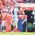 DENVER, CO - OCTOBER 1:  Quarterback Derek Carr #4 of the Oakland Raiders celebrates after throwing a 64-yard touchdown pass in the second quarter of a game against the Denver Broncos at Sports Authority Field at Mile High on October 1, 2017 in Denver, Colorado. (Photo by Dustin Bradford/Getty Images)