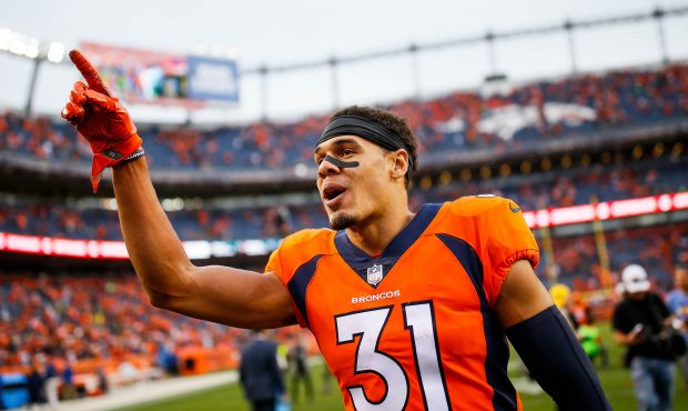 Strong safety Justin Simmons #31 of the Denver Broncos points to the stands as he walks off the fie...