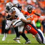 DENVER, CO - OCTOBER 1:  Running back Marshawn Lynch #24 of the Oakland Raiders is tackled by outside linebacker Von Miller #58 of the Denver Broncos during a game at Sports Authority Field at Mile High on October 1, 2017 in Denver, Colorado. (Photo by Justin Edmonds/Getty Images)
