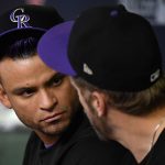 PHOENIX, AZ - OCTOBER 04: Gerardo Parra #8 of the Colorado Rockies talks with teammate Mark Reynolds #12 during batting practice before the start of the National League Wild Card game against the Arizona Diamondbacks at Chase Field on October 4, 2017 in Phoenix, Arizona.  (Photo by Norm Hall/Getty Images)