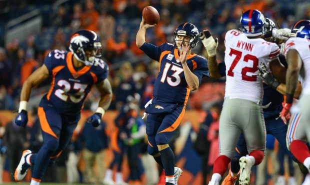 DENVER, CO - OCTOBER 15: Quarterback Trevor Siemian #13 of the Denver Broncos passes against the Ne...