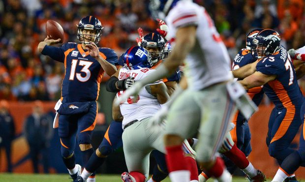 DENVER, CO - OCTOBER 15:  Quarterback Trevor Siemian #13 of the Denver Broncos passes against the N...