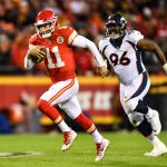 KANSAS CITY, MO - OCTOBER 30: Quarterback Alex Smith #11 of the Kansas City Chiefs runs from the pursuit of defensive end Shelby Harris #96 of the Denver Broncos during the second quarter of the game at Arrowhead Stadium on October 30, 2017 in Kansas City, Missouri. ( Photo by Peter Aiken/Getty Images )