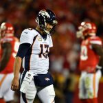 KANSAS CITY, MO - OCTOBER 30:  Quarterback Trevor Siemian #13 of the Denver Broncos walks off the field after throwing an interception during the game against the Kansas City Chiefs at Arrowhead Stadium on October 30, 2017 in Kansas City, Missouri.  (Photo by Peter Aiken/Getty Images)