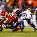 KANSAS CITY, MO - OCTOBER 30: Running back Charcandrick West #35 of the Kansas City Chiefs is tackled by strong safety Justin Simmons #31 of the Denver Broncos during the third quarter of the game at Arrowhead Stadium on October 30, 2017 in Kansas City, Missouri. ( Photo by Jason Hanna/Getty Images )